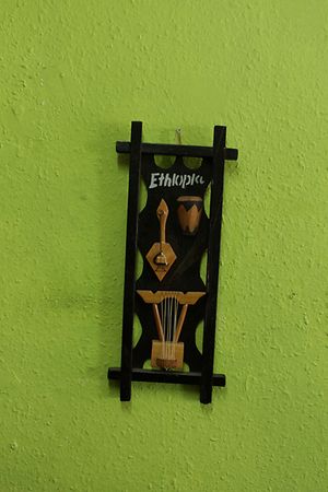 Andu Cafe's Interior design - drawings of Ethiopian musical instruments  at Andu Caffe in East London