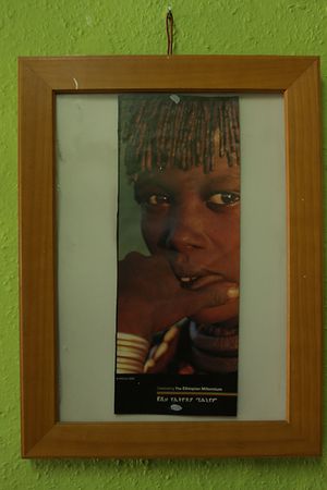 Andu Cafe's Interior design - picture of a person from one of Ethiopian tribes  at Andu Caffe in East London