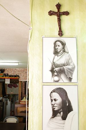 Andu Cafe Interior design - drawings of traditional Ethiopian people at Andu Caffe in East London