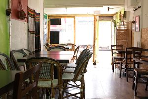 The interior of Andu Cafe - inside the cosy restaurant  Inside to outside view at Andu Caffe in East London