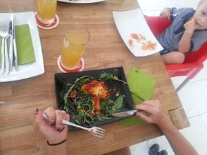 Polenta/tomato dish with arugula at triVida in Klagenfurt