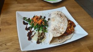 chili sin carne tortilla wrap. stuffed everything on plate inside and munched my way through it. full enjoy. at triVida in Klagenfurt