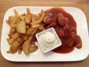 vegan currywurst with fries and vegan mayo at Butze in Dusseldorf