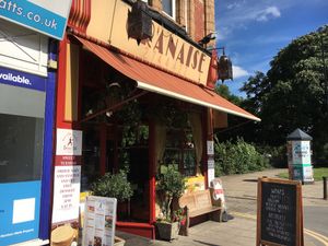 outside  at Oranaise Cafe in Leeds