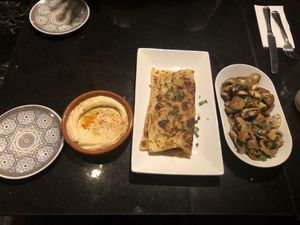 Hummus, flatbread and mushroom starters at Oranaise Cafe in Leeds