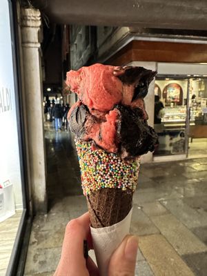 Raspberry with chocolate cream flavor on a sprinkle chocolate cone  #Veganuary at Gelatoteca SuSo in Venice