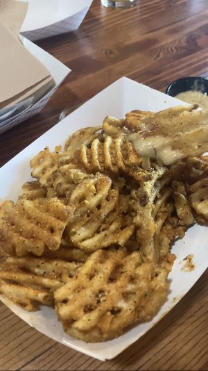 Trolley Chips with Cajun seasoning and vegan habanero ranch 😋  at Trolley Wing Company in Salt Lake City