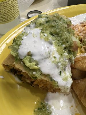 Vegan chimichanga with green salsa and vegan sour cream   at Momcorn in Gurnee