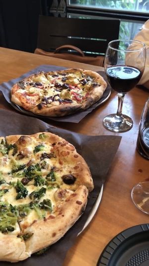 Capri Pesto and Broccoli Bianca - two of five vegetarian specialty pizzas! at Fiazza Fresh Fired - Byward Market in Ottawa