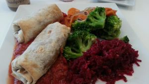 vegan burrito with sides at Bioway in Warsaw