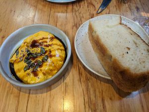 House made focaccia and pumpkin hummus dip at Transformer Nextdoor in Fitzroy