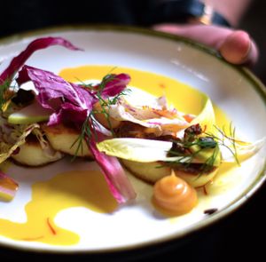 Grilled Haloumi with Pear Walnuts, bitter leaves, Saffron syrup at Transformer Nextdoor in Fitzroy