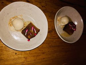 Orange, almond & polenta pudding w/ rosemary ice cream & pine nuts  at Transformer Nextdoor in Fitzroy