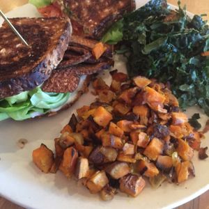 Tempeh, Lettuce & Tomato sandwich w sweet potato hash and kale salad at True Food Kitchen in Atlanta