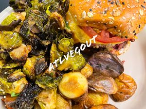 Double vegan burger with brussel sprouts   at True Food Kitchen in Atlanta