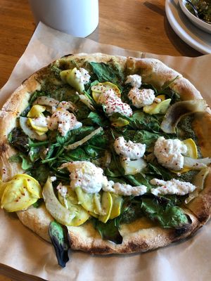 Grilled artichoke and pesto pizza  at True Food Kitchen in Atlanta