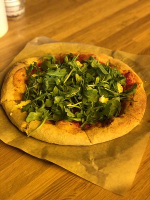 Arugula pizza with added vegan ricotta at True Food Kitchen in Atlanta