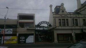 The easiest entry on Commercial Rd, to find where it is inside the market. Once you get through, you'll see the green stall opposite. at The Falafel Man - Food Cart in South Yarra