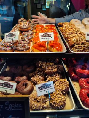 Top Row - Chocolate Dipped, Creme Brulee, and Apple Fritter at Donut Bar in San Diego