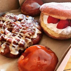Creme brûlée, apple fritter and strawberry split at Donut Bar in San Diego