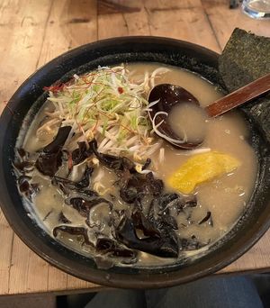 Vegan Thai ramen, light spicy coconut base broth, with tofu and veggies (mushroom, zucchinis, corn, seaweed, etc.)  at Jin Ramen - Upper West Side in New York City