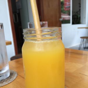 orange juice  at Backyard Cafe - Riverside in Phnom Penh