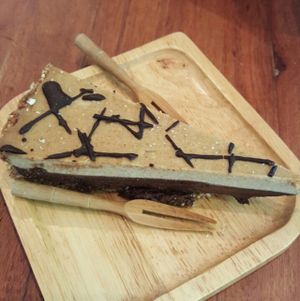 raw chocolate and salted caramel cake  at Backyard Cafe - Riverside in Phnom Penh