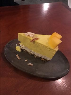 Raw mango and vanilla cheesecake- vegan and gluten free  at Backyard Cafe - Riverside in Phnom Penh