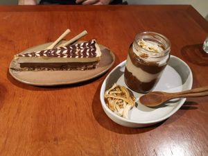 Chocolate cake with seasalt, and peanutbutter and Chocolate mousse at Backyard Cafe - Riverside in Phnom Penh
