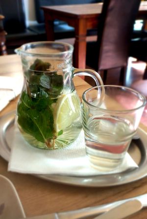 Hot water with ginger, mint & lemon at Erbils in Munich