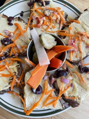 Hummus toast with picked veggies  at Redwing Cafe in Seattle