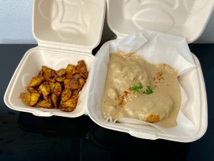 biscuits + gravy + roasted potatoes (takeout) at Redwing Cafe in Seattle