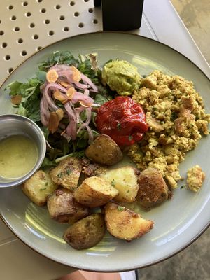 Part of breakfast platter: tofu scramble, potatoes, salad, guacamole, pepper    at Berlingeri Cocina Artesanal in San Juan