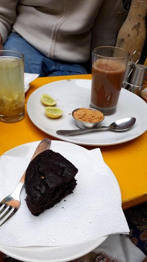 Vegan chocolate cake and indian massala tea with soy milk at Vegan and Raw in Varanasi