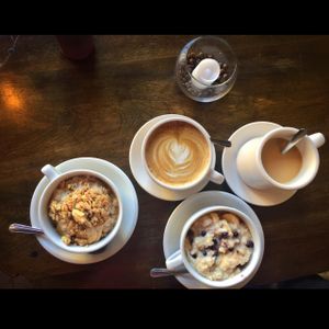 Organic blueberry oatmeal and latte  at Red Pipe in Forest Hills