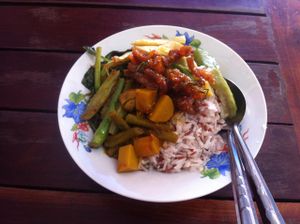 Buffet mix on top of steamed rice at Veg Restaurant - Maenam Khwae in Kanchanaburi