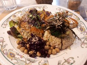 Todsys main dish with crispy tofu-avocado "steaks" at Integral Figueres in Figueres