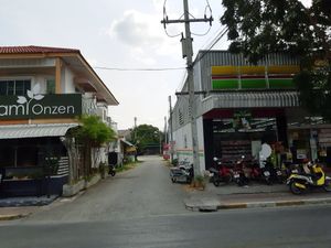 The way to the restaurant, walk into this street and you will find it on the left hand side at Vegetarian Food - Maenamkwai Rd in Kanchanaburi