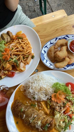 Top: udon noodles with TomYum sauce and vegan duck. Bottom: rice noodles with mango curry sauce and vegan duck. Right: shrimpz   at Chay Viet in Dresden