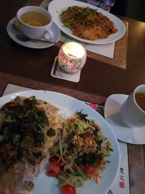 Rice noodles with tofu ans seitan in peanut sauce and side salad at Chay Viet in Dresden
