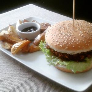 they serve two different burgers - one is sweet potatoes burger and another one with fried tofu burger. at GYVAS baras in Vilnius
