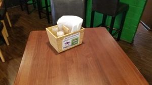 HappyCow stickers on every table at GYVAS baras in Vilnius