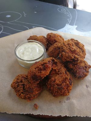 The BEST chicken nuggets I've ever had! And that sauce!! at GYVAS baras in Vilnius