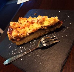 plum kuchen with streusel  at Roots in Dresden