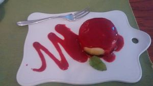 Cashew cake with raspberry sauce at Ambasada in Warsaw