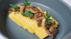 corn polenta cake with sauteed mushroom at NAKEDFOOD in Taipei