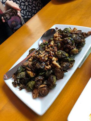 Happy hour Brussel Sprouts no Cheese makes it vegan 🌱   at Sammy's Woodfire Pizza in Las Vegas