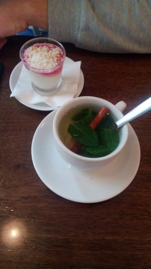 3rd course of the lunch menu - dessert or tea. Vegetarian cream with fruit jelly and fresh tea with mint, ginger and cinnamon at Hummus in Barcelona