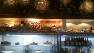 cakes fridge and wall menu at VITA - Palermo in Buenos Aires