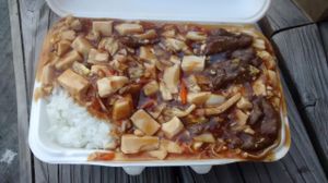 Tofu and seitan dish with rice at Peaceful Loft in St Johns
